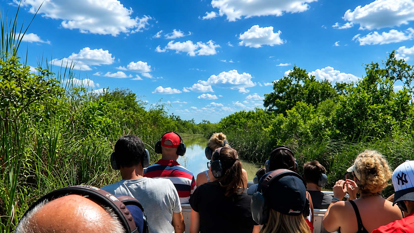 Airboat traveling through the Florida Everglades on a tour from Miami